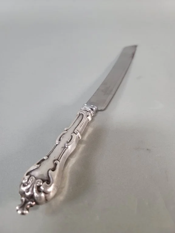 043 - Lot 448 - Sterling silver handle English carvings knife.jpg