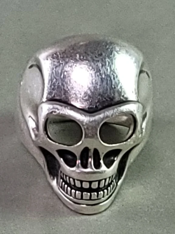 061 - Lot 236 - Signed Thomas Sabo sterling silver skull ring.jpg