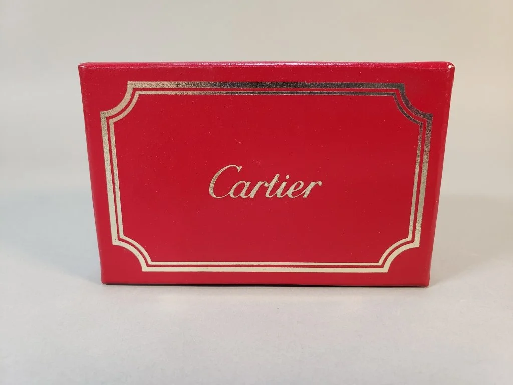 077_Lot_157_Four_Cartier_Trinity_crystal_and_sterling_silver_salt_and_pepper_shakers.jpg