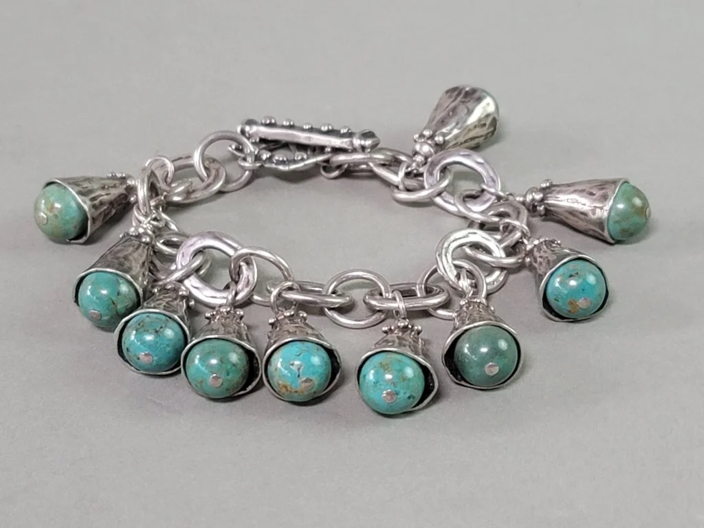 080_Lot_269_Sterling_silver_and_turquoise_charm_bracelet.jpg