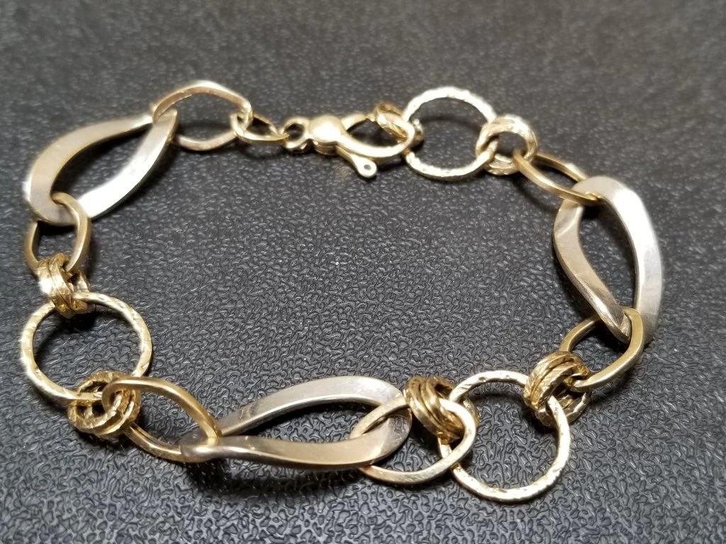 034_Lot_168_14k_textured_two_tone_gold_bracelet_Clasp_bent.jpg