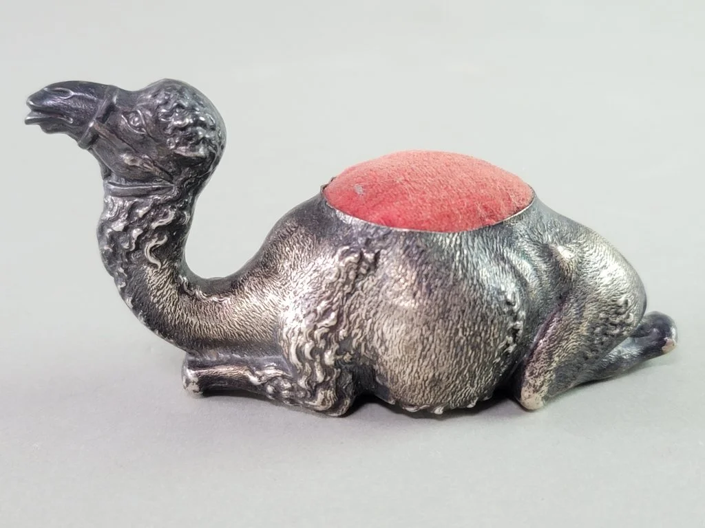 067 - Lot 424 - Sterling silver camel pin cushion.jpg