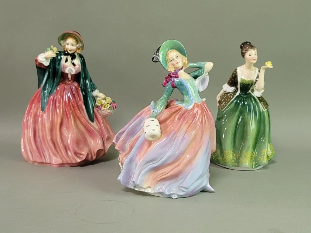 124_Lot_669_Three_Royal_Doulton_porcelain_figures.jpg