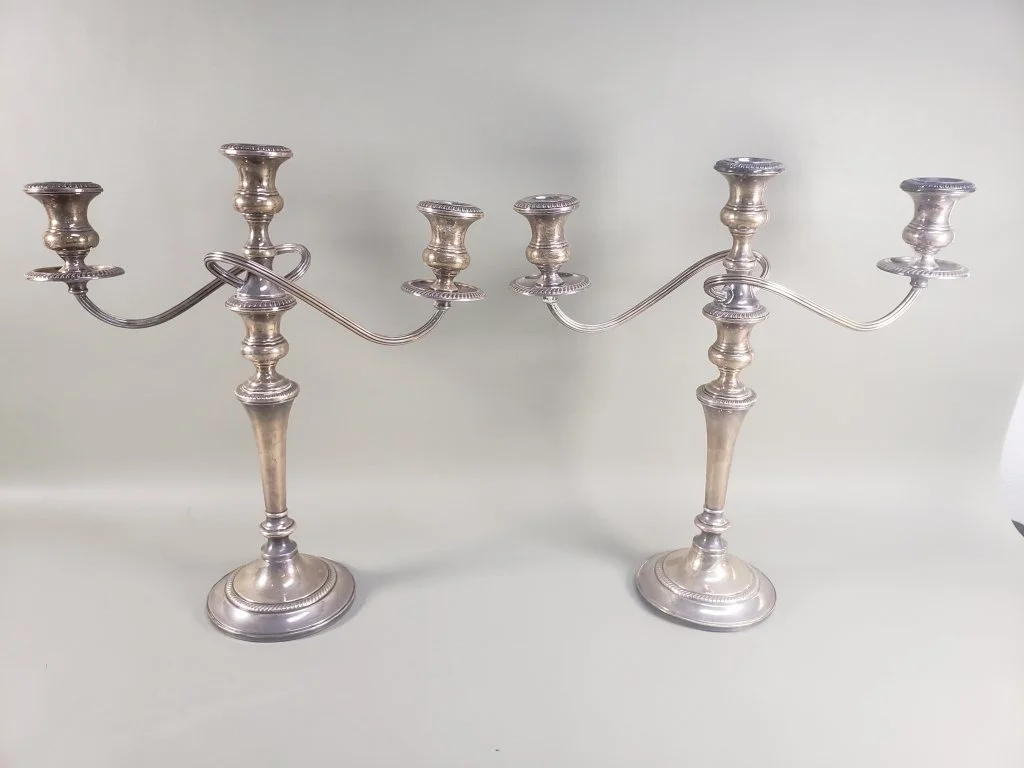 009 - Lot 61 - Pair of sterling silver weighted candlesticks.jpg