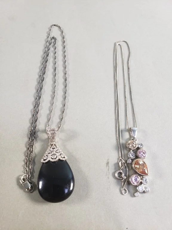 177 - 145 Sterling silver pendant necklaces one with onyx.jpg