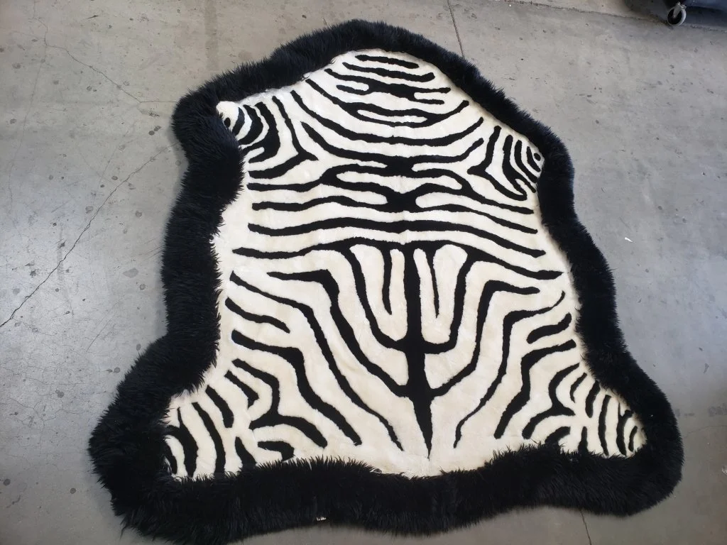 106_Lot_608_Cowhide_rug.jpg