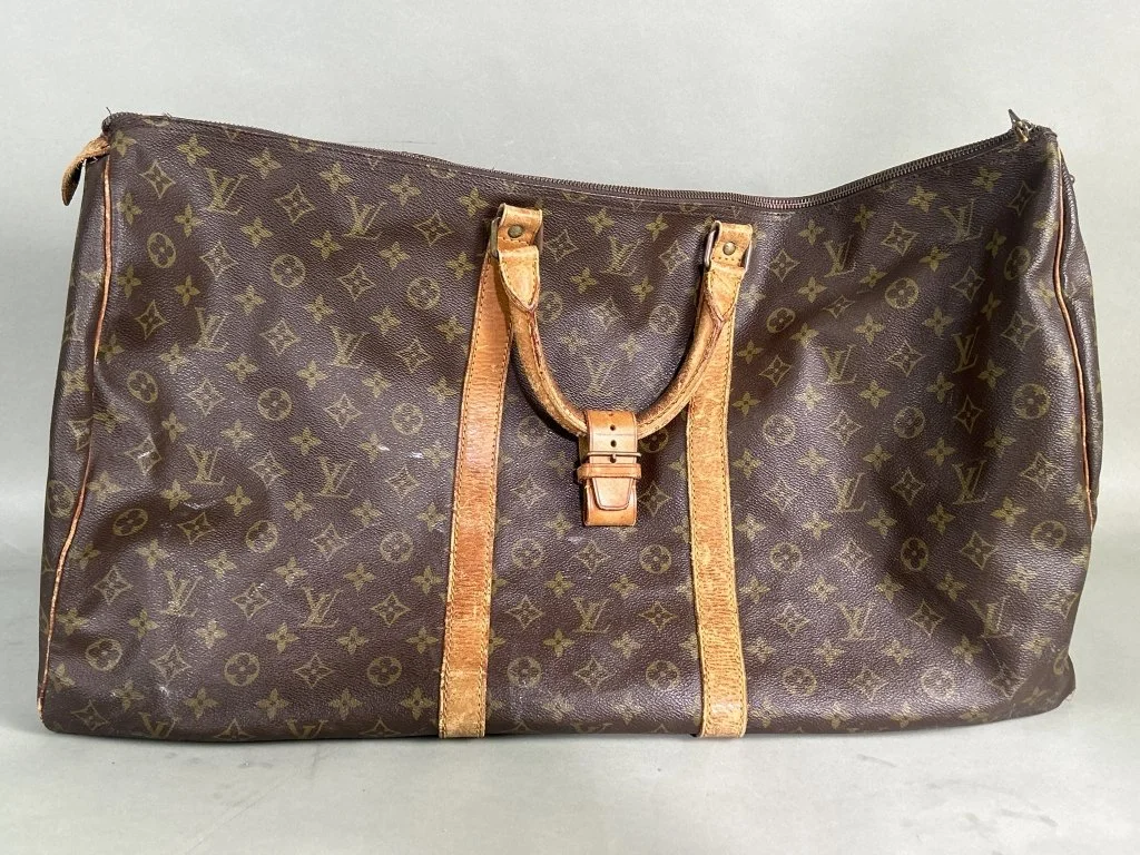 028 - Lot 604 - Vintage Louis Vuitton - French Company Sac Souple travel bag.jpg