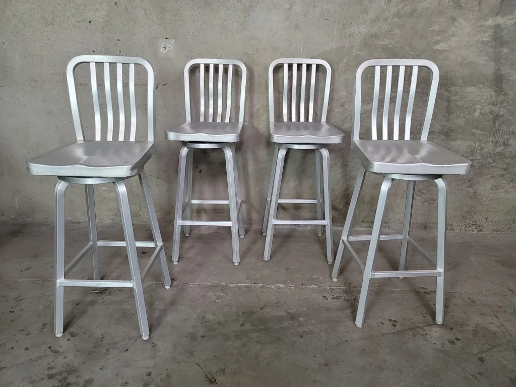 088 - Lot 446 - Four aluminum swivel bar stools.jpg