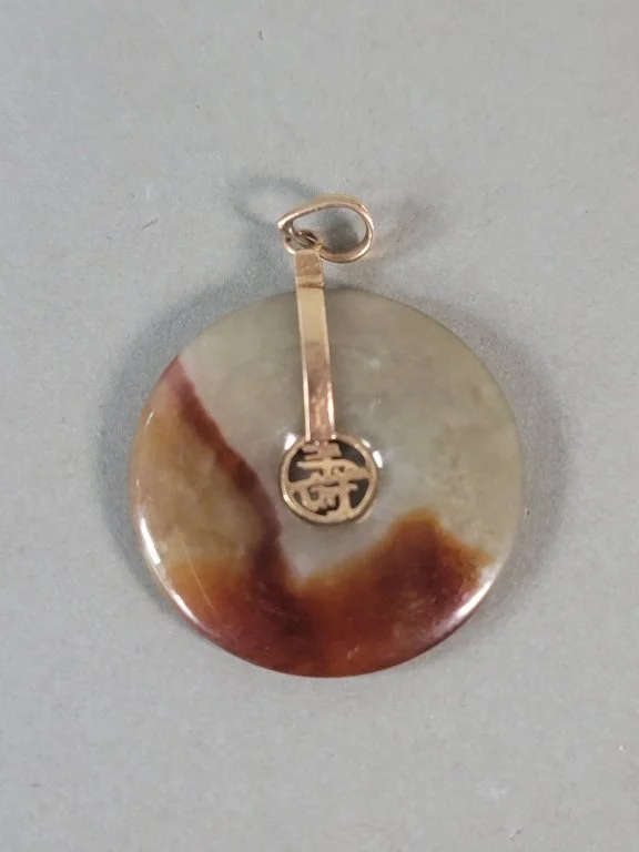 021 - Lot 621 - Jade and 14k gold pendant.jpg