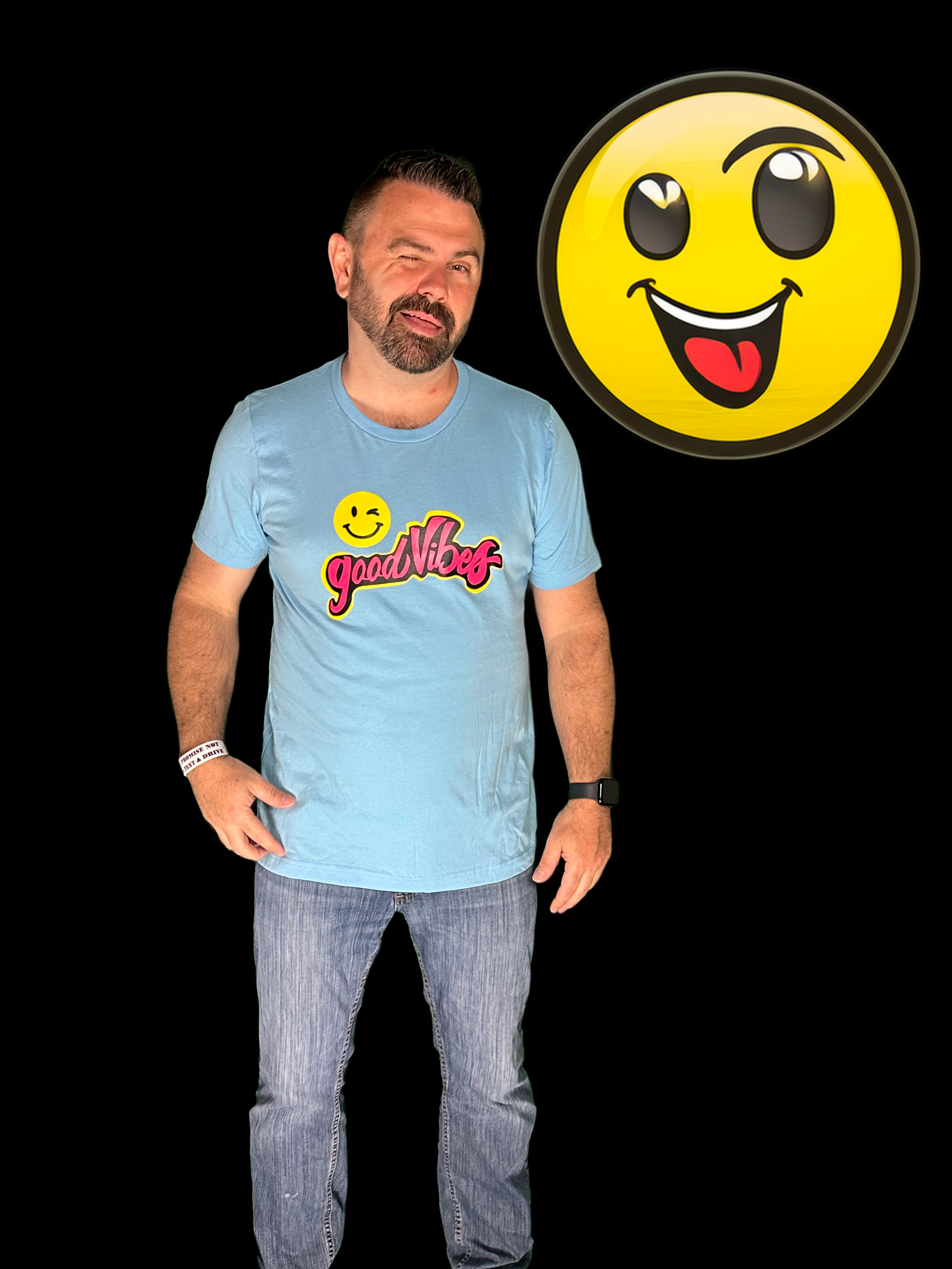 Good Vibes - ocean blue t-shirt - wink with smiley face background.png