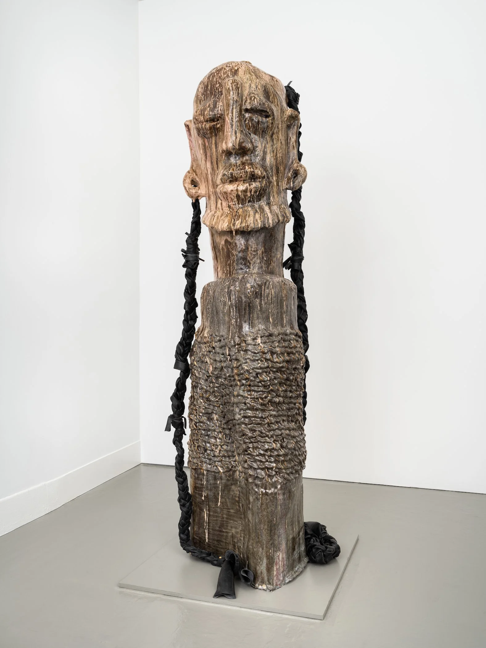Baawala from the Kuchu Mamba (Lungfish) Clan, 2022, 89 x 23 x 22 in., Glazed ceramic, bicycle tire inner tubes, aluminum wire.jpg
