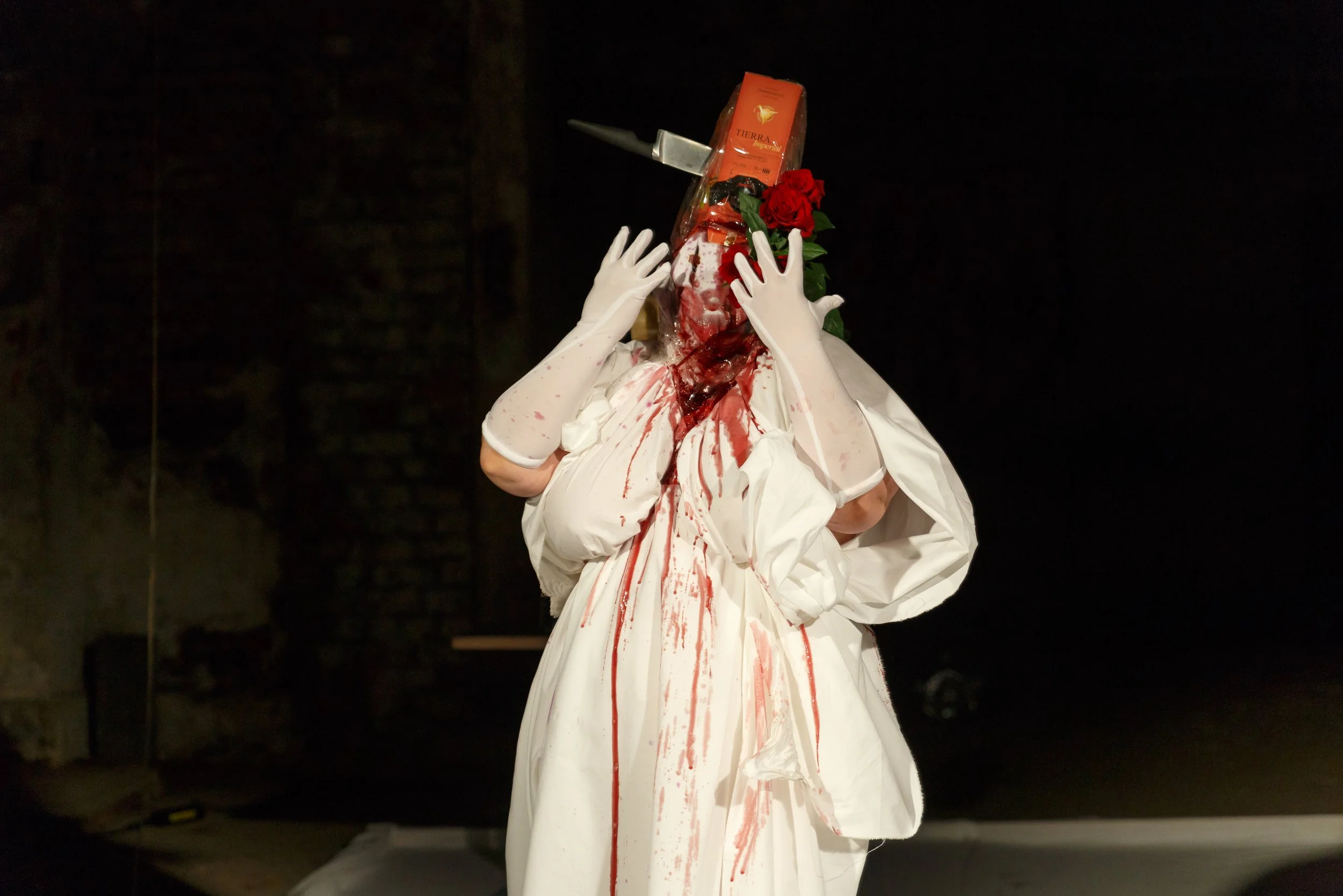 Given Over to Want, 2019, variable dimensions, performance, wine, sheets, knife, flowers, cigarette..jpg