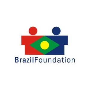 Logo of Brazil Foundation featuring two abstract human figures, one red and one blue, with a Brazilian flag in the center, and the text 'BrazilFoundation' underneath.