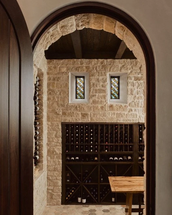 Designed around the life our client envisioned.
This custom wine cellar was created as a place to linger&mdash;where friends are invited in, a bottle is opened, and stories are shared. Inspired by a romantic narrative and layered with pieces from fam