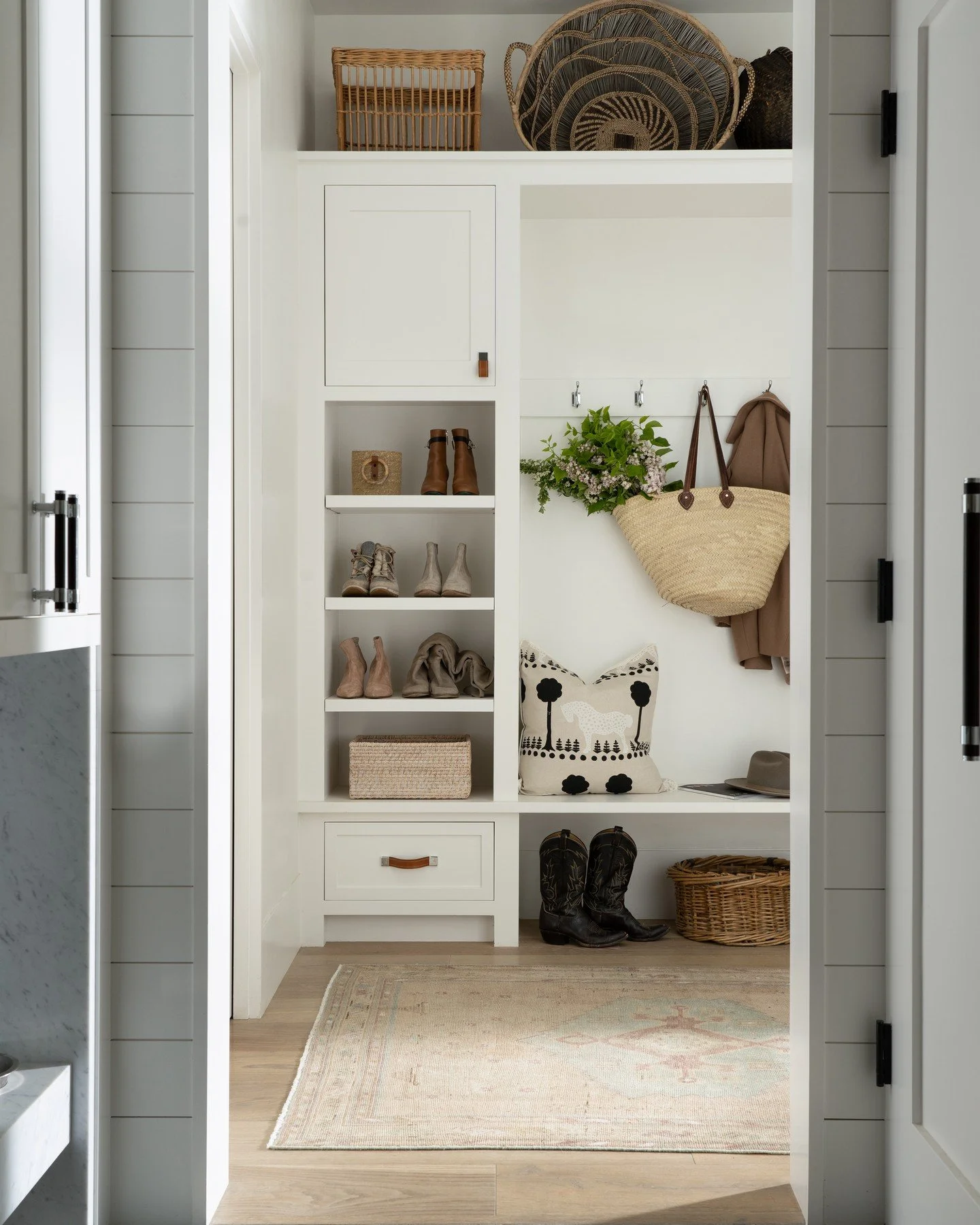Mudrooms have to be built for real life first.

They are the first point of entry into the home, designed to handle muck, dirt, and whatever you are carrying in your hands when you walk through the door. Function has to lead the design, not follow it