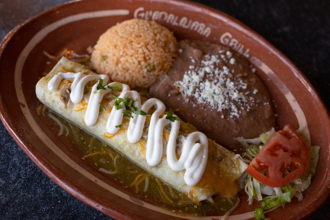 The Enchilada Suiza is here for the Salsa Verde lovers! A grande chicken enchilada wrapped in a flour tortilla, smothered in green sauce, cheese and sour cream!​​​​​​​​
 #GUADSQUAD