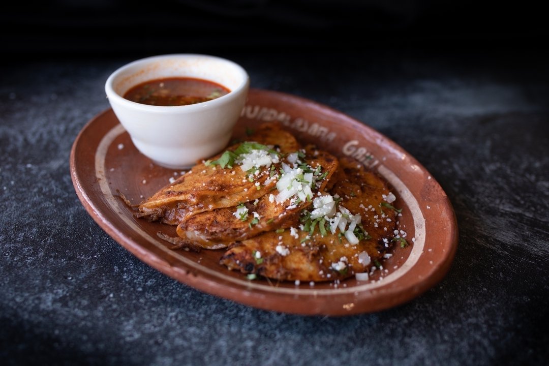 Our Quesabirria Tacos are one of our best sellers for a reason! Cris' family recipe for Birria has been passed down to make a new and modern dish.