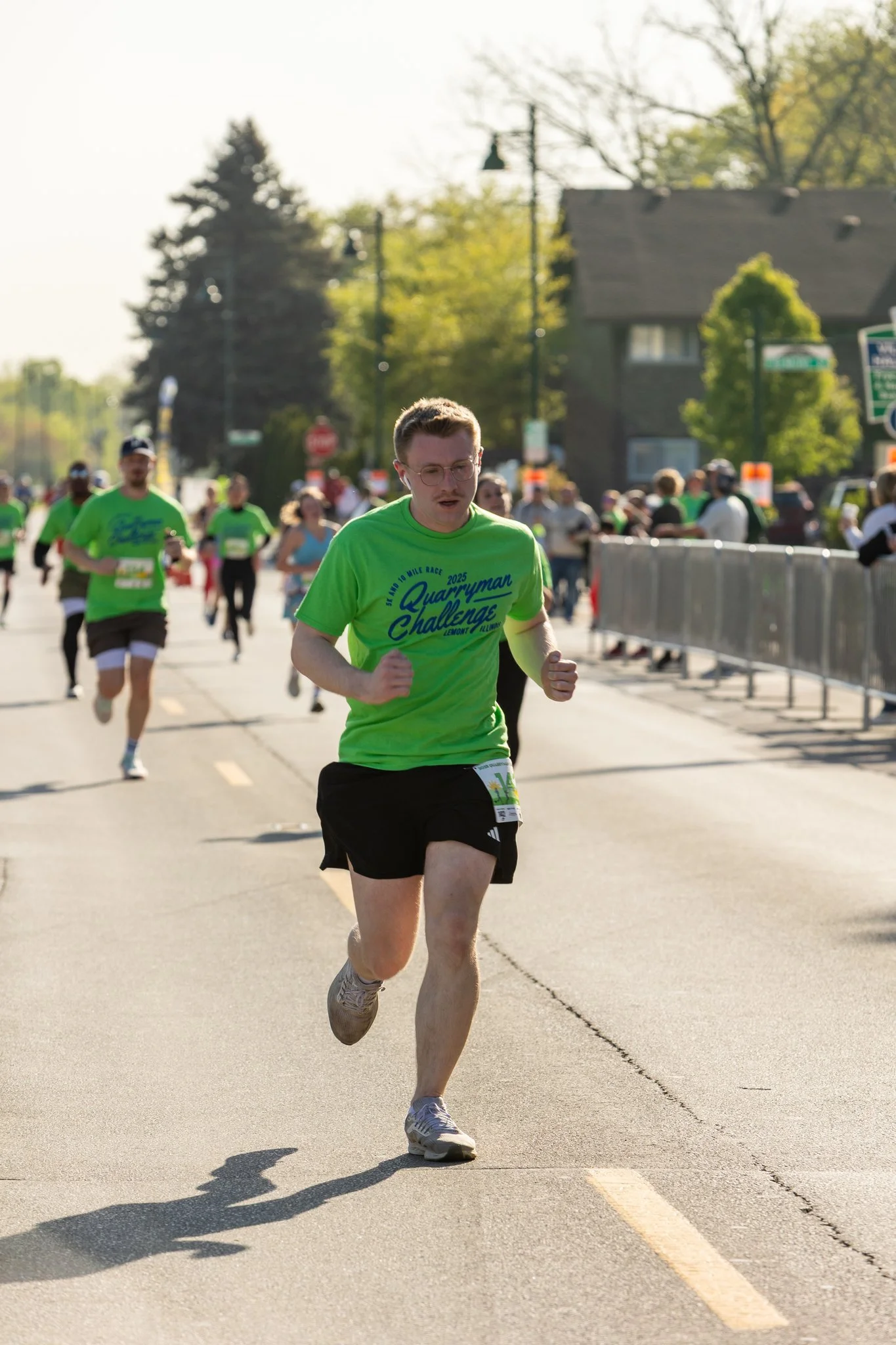 A photo of a running participant for the Quarryman Challenge in Lemont Downtown Illinois.