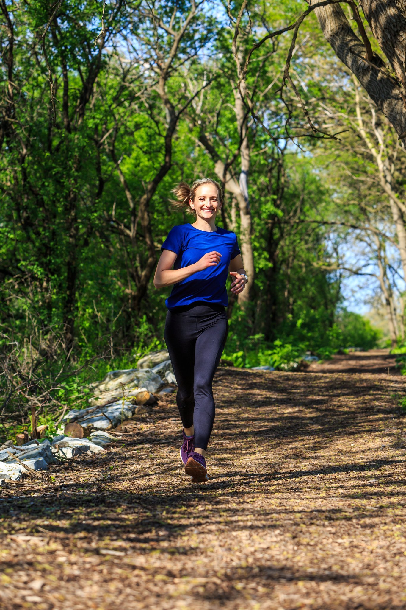 A photo of a runner passing through hills in Lemont Downtown, Illinois.