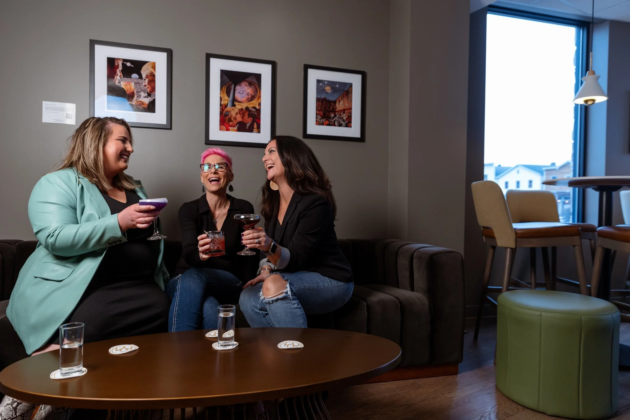 A photo of three friends enjoying martinis and cocktails at Pollyanna Social in Lemont Downtown, Illinois.