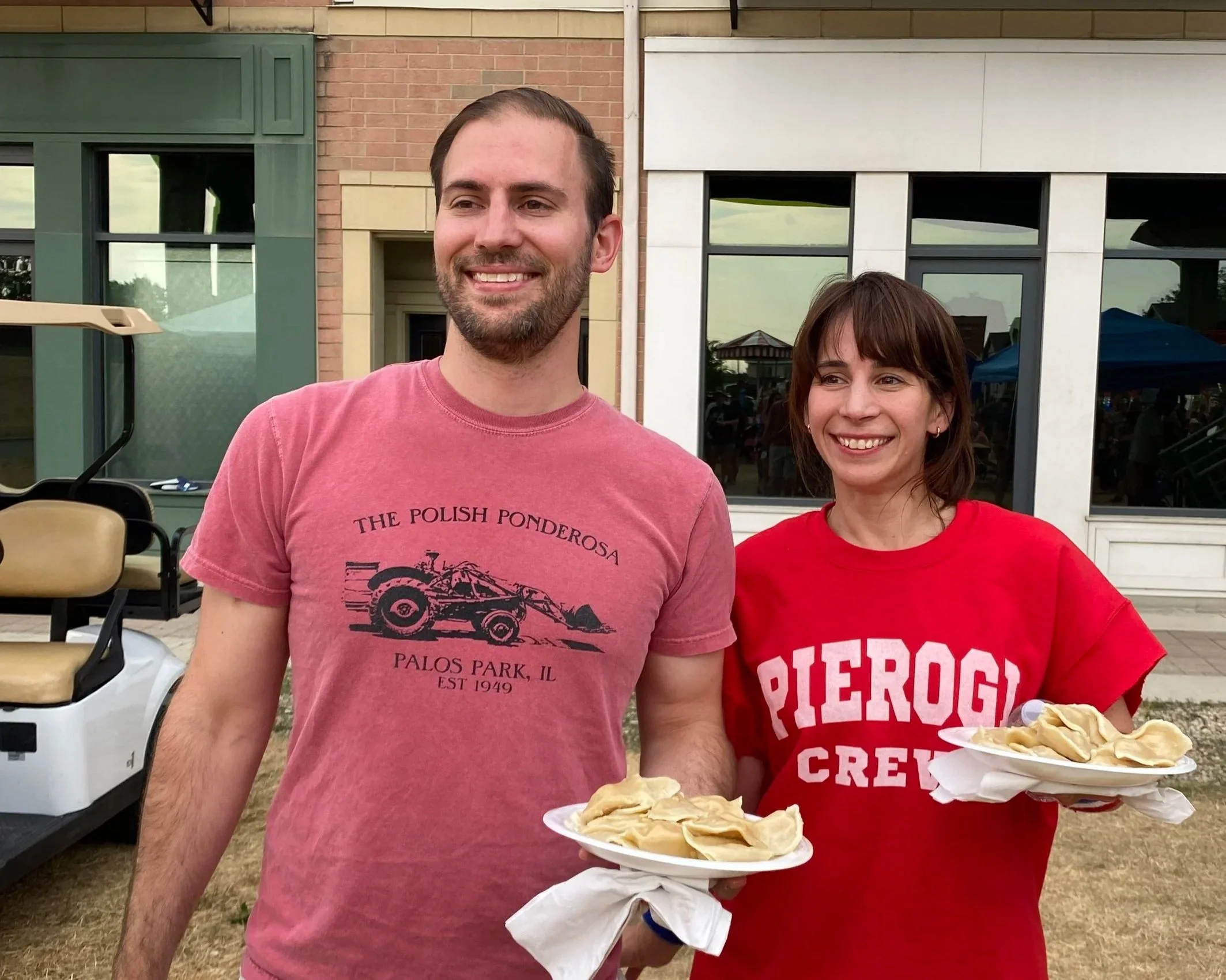 A photo of two pierogi eating contest participants in Lemont, Illinois.