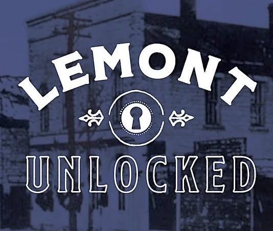 Lemont Unlocked Logo with blue overlay over a historic photo showcasing some of Lemont Downtown's architecture