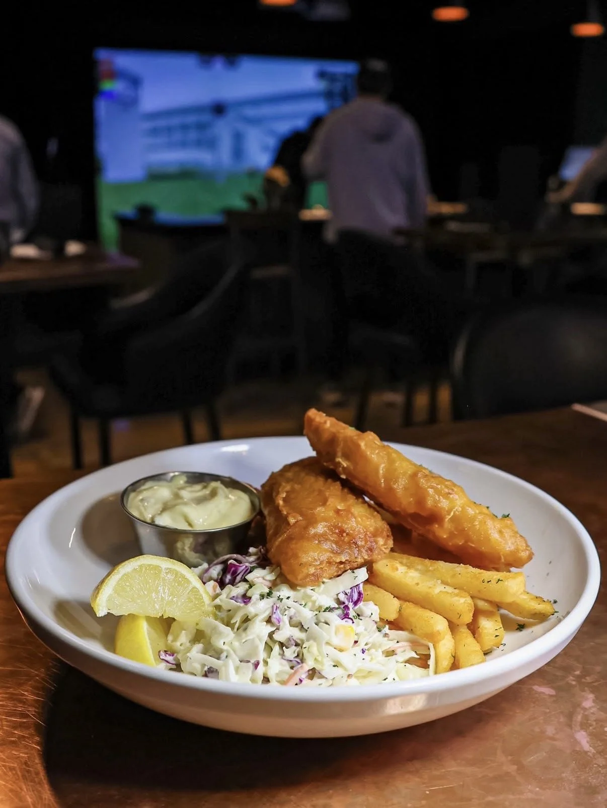 A photo off crispy beer-battered fish at The Club in Lemont Downtown, Illinois.