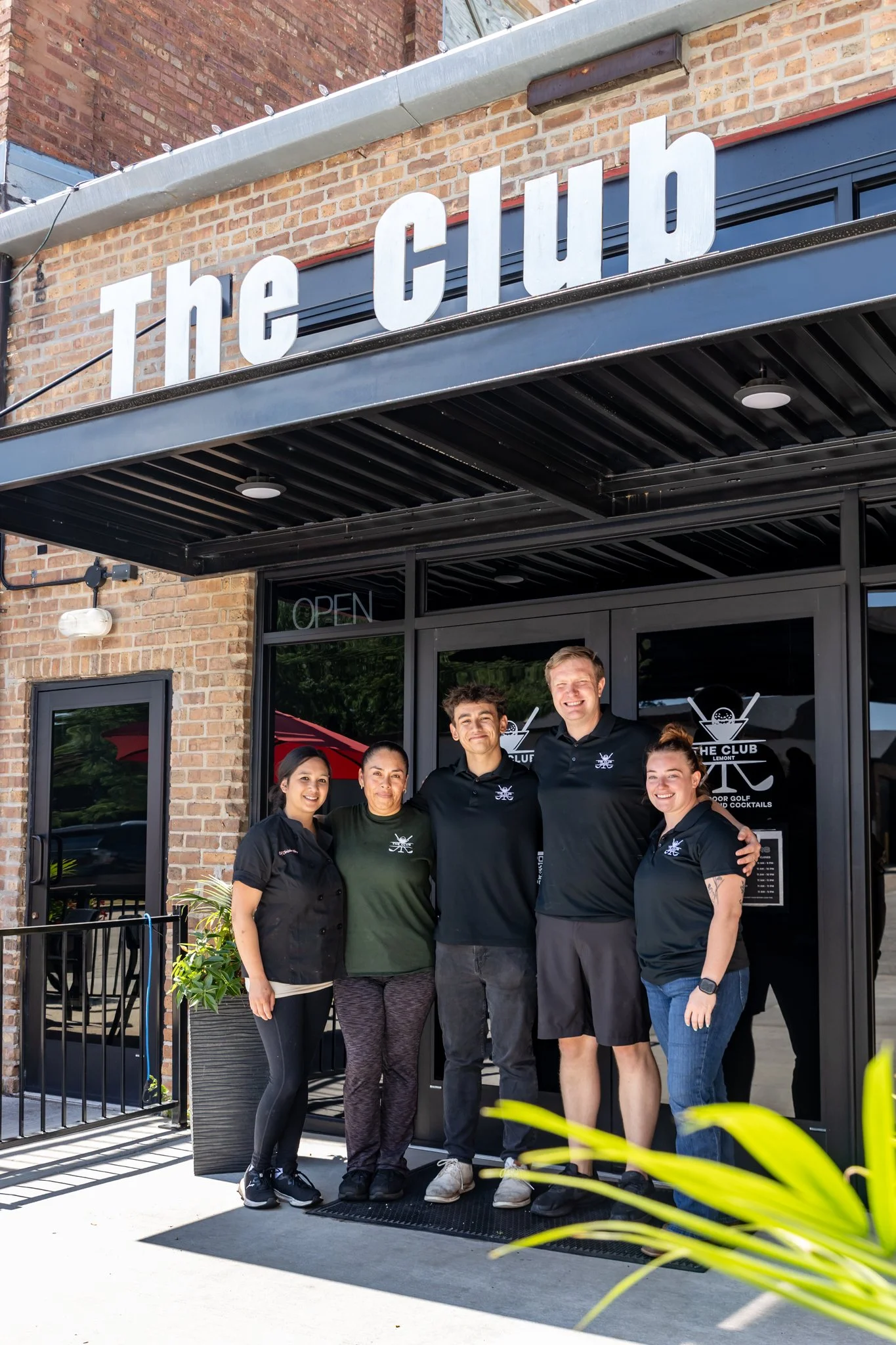 A photo of staff members of The Club, located in Lemont, Illinois.