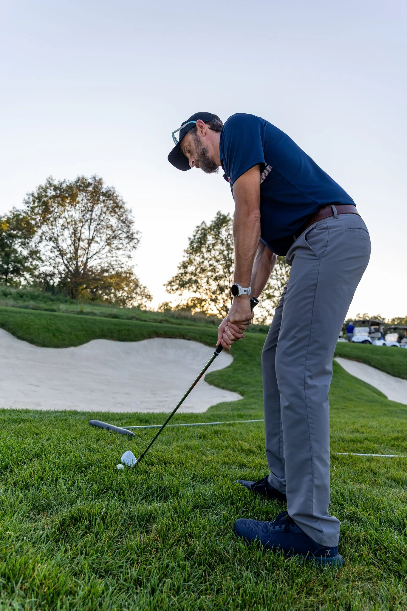 A photo of an avid golfer playing at Cog Hill Golf & Country Club.