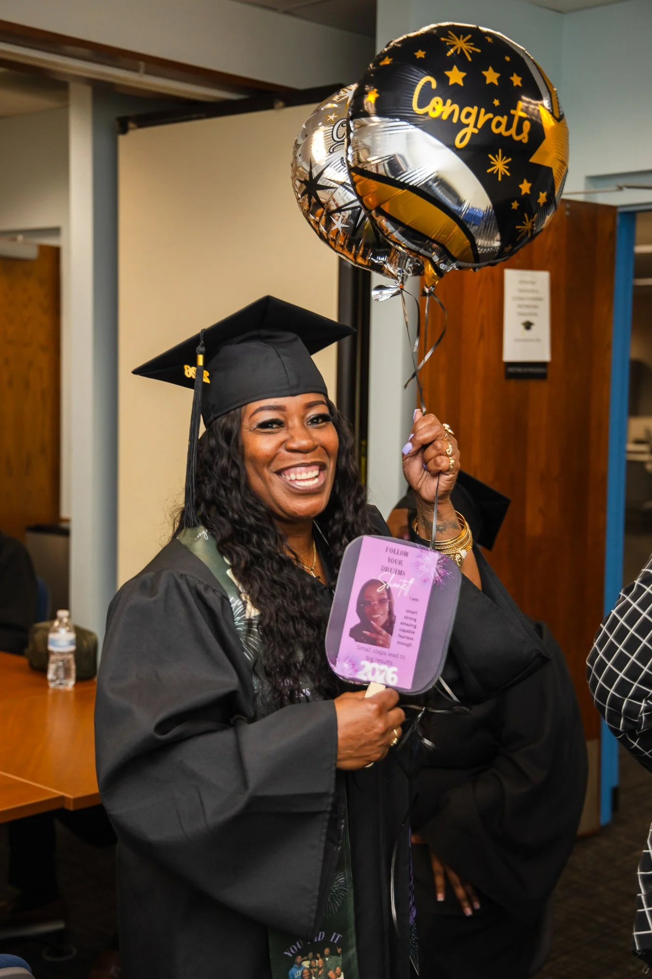 Woman Holding a Balloon: Nonprofit Event Photography Houston