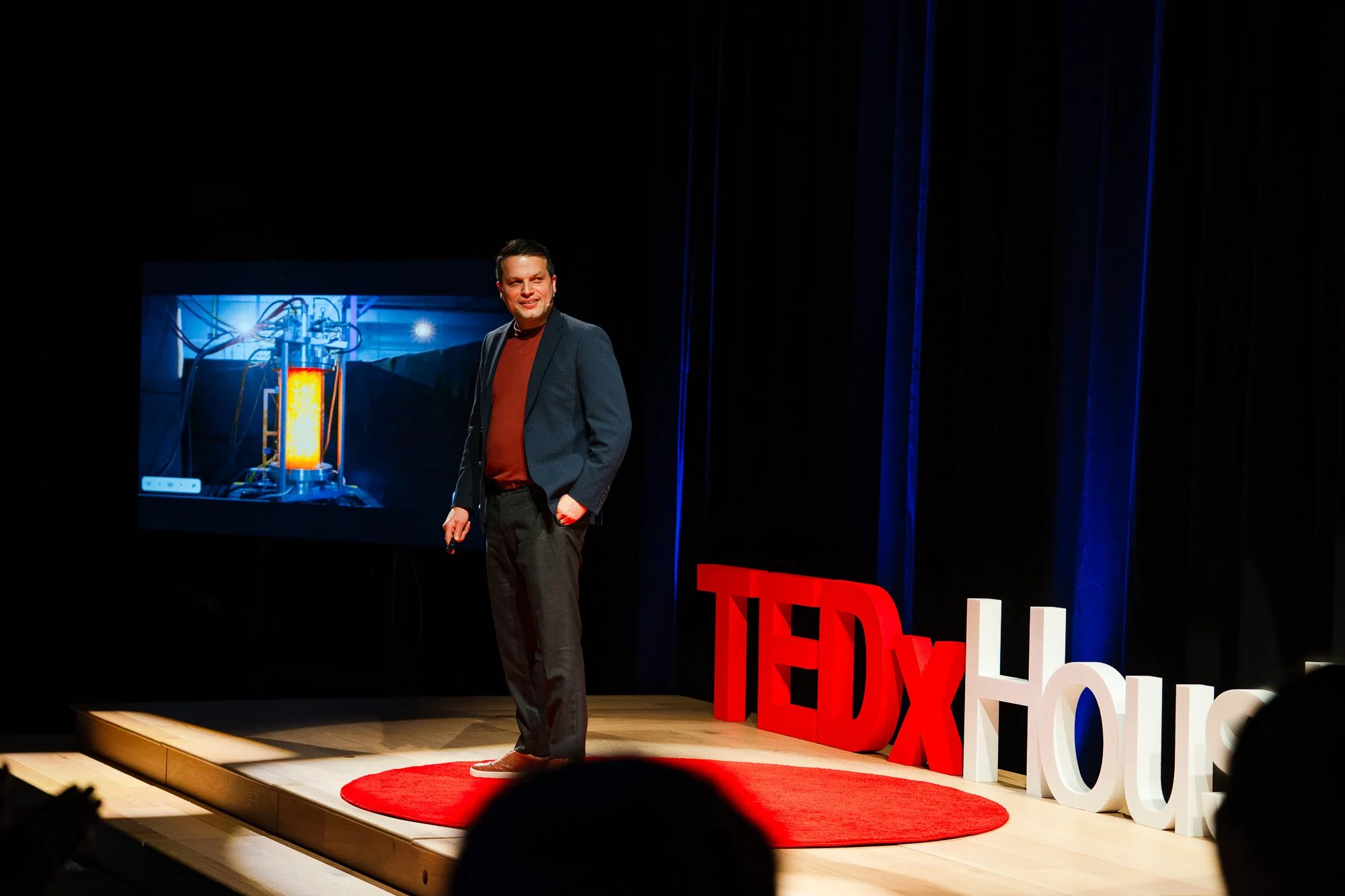 TedxHouston Speaker Smiling at the crowd