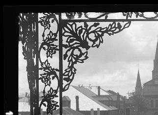 1920s-view-of-st-louis-cathedral-through-a-balcony.jpg