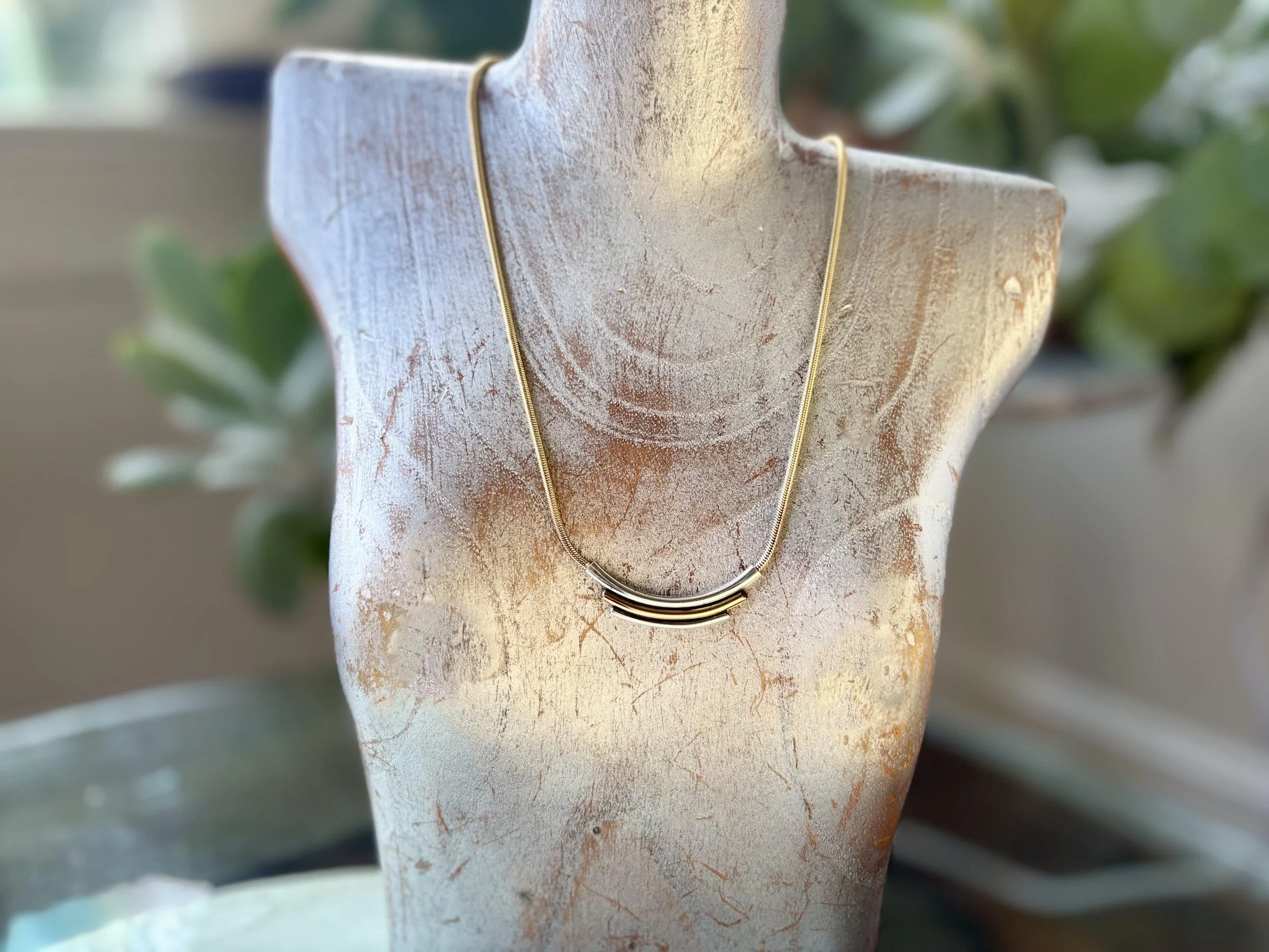 gold chain on bust.jpg