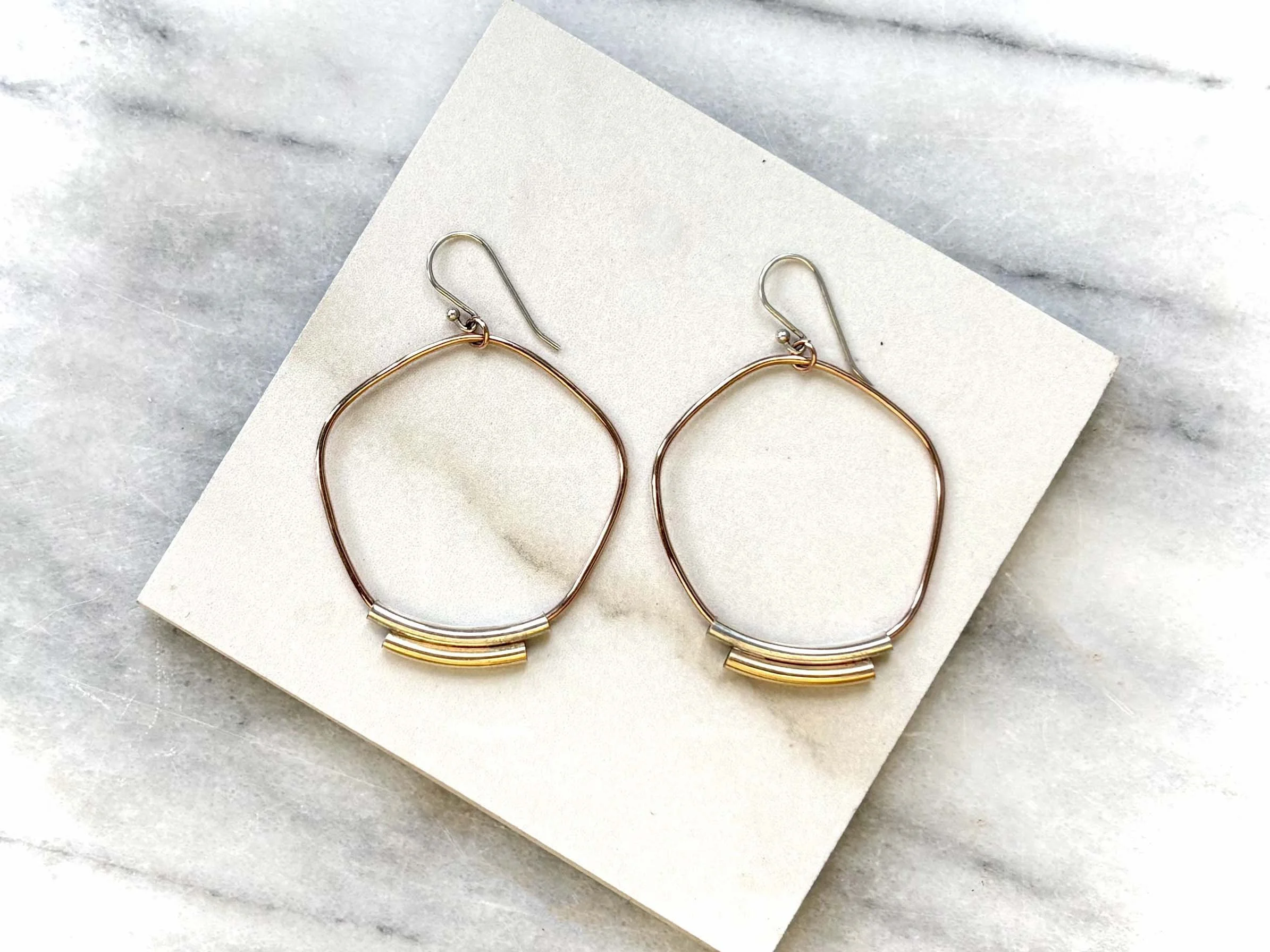 pentagon earrings.jpg