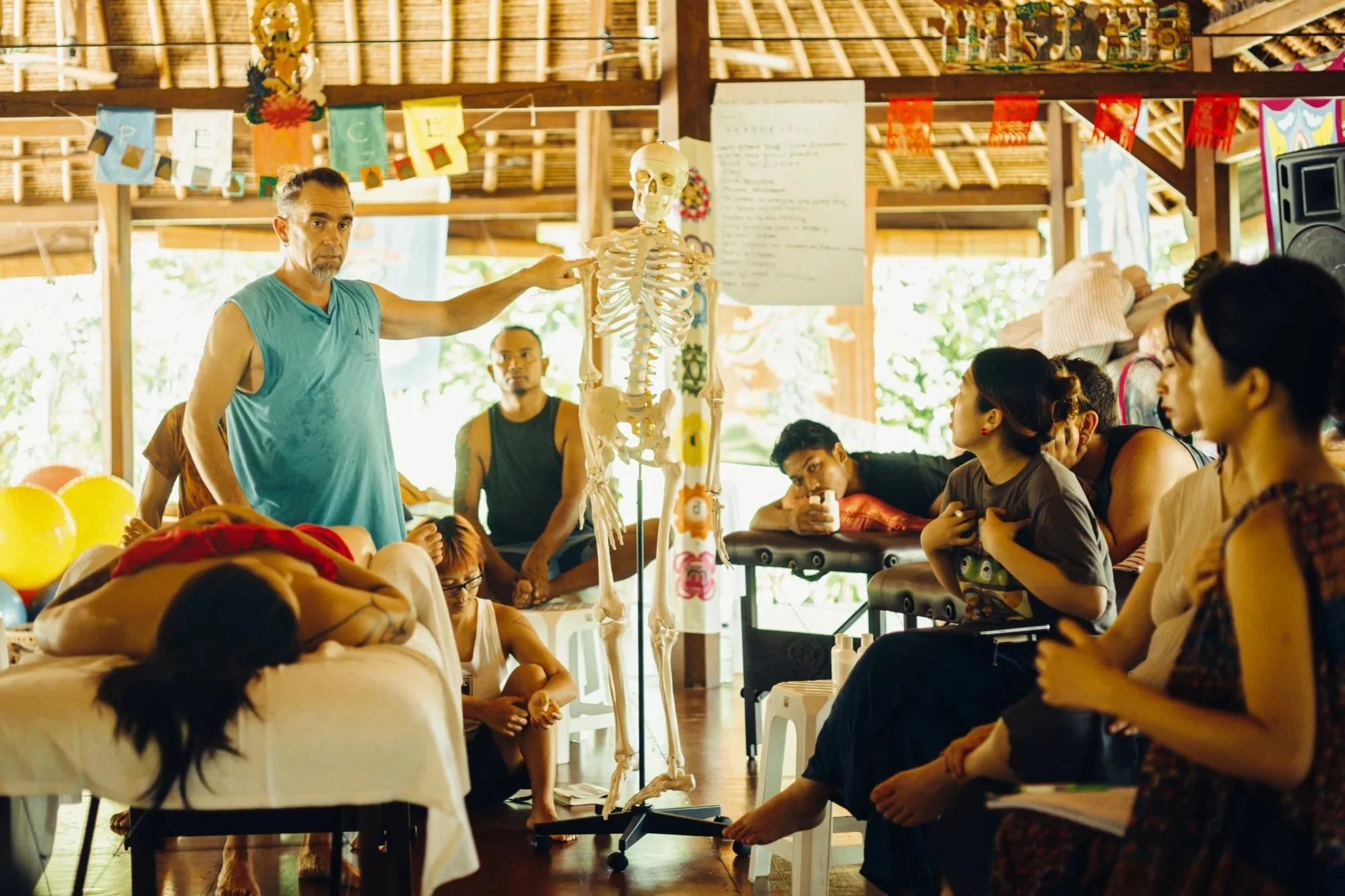 Rob Wilks teaching experiential anatomy during Esalen massage bodywork certification training Bali