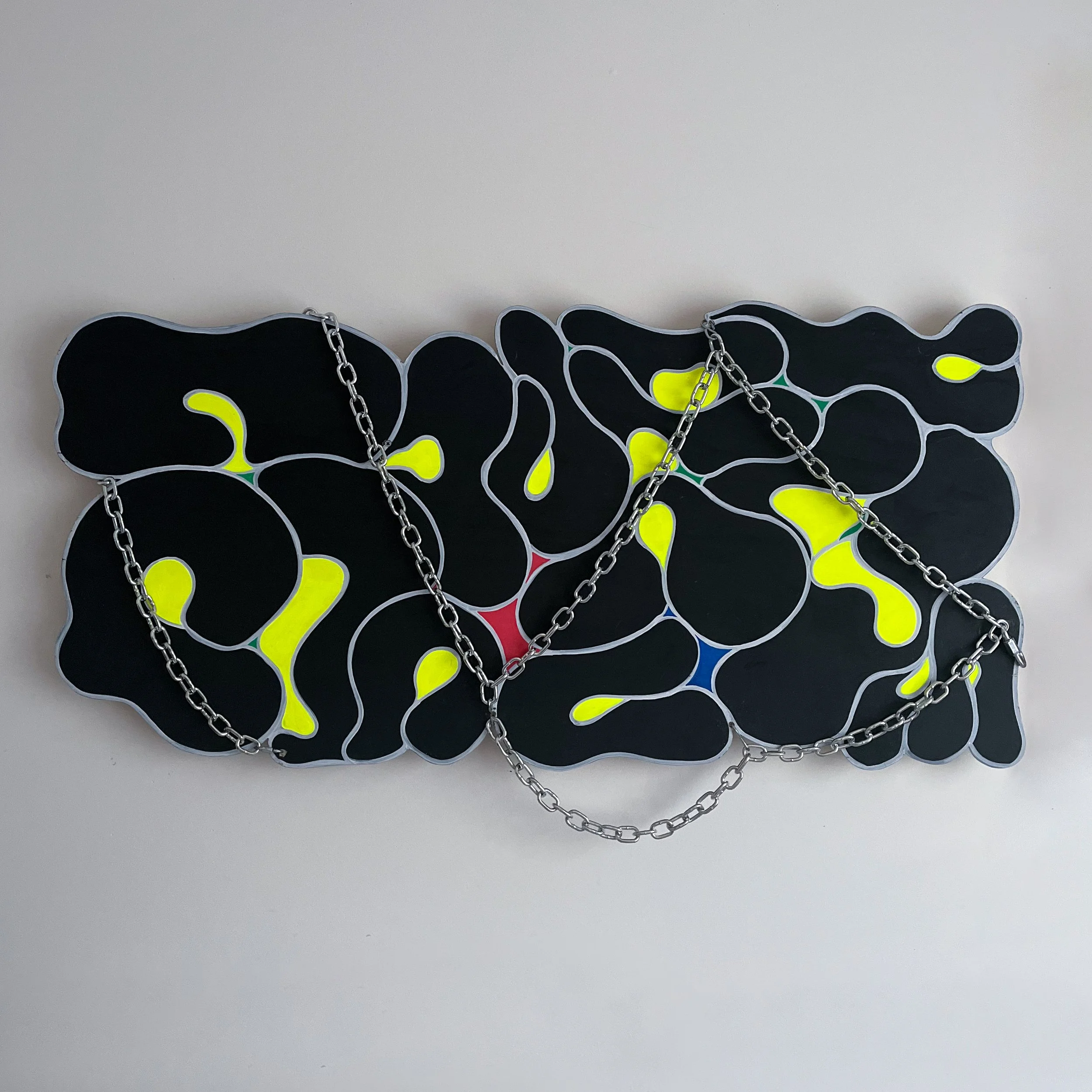 "Authentic Convictions" A collage of expressive forms created with acrylic paint on wood, embellished w/chain. 