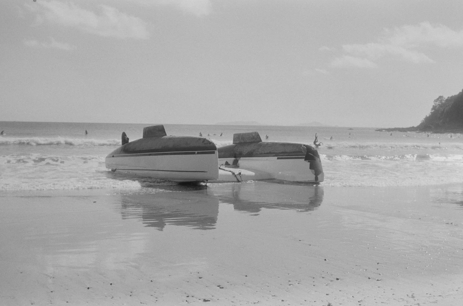 olive bly | beached catamaran (Sandy Bay, Tutukaka Coast, Aotearoa)