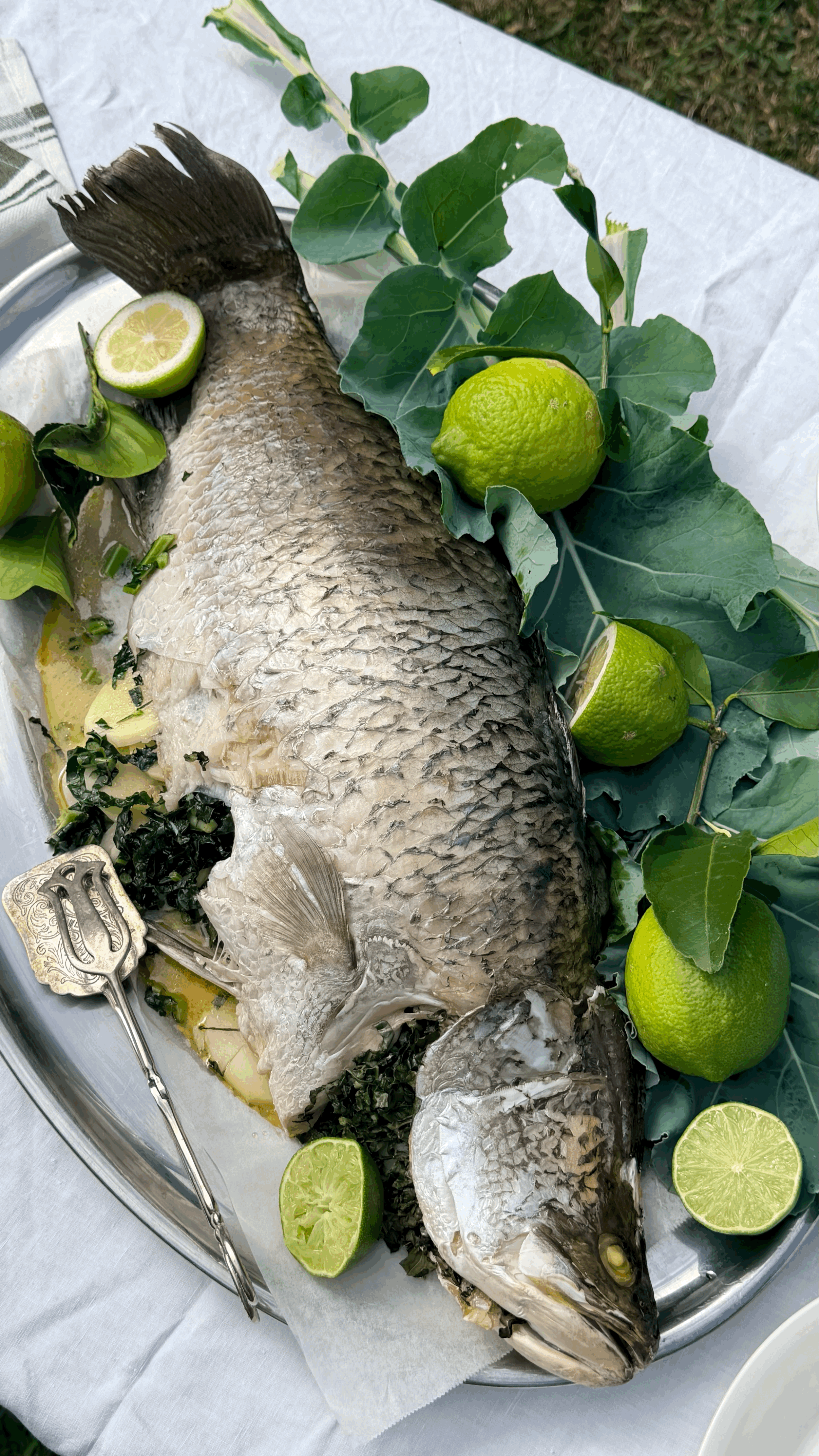 Whole Baked Barramundi with Lemon, Potato &amp; Kale.