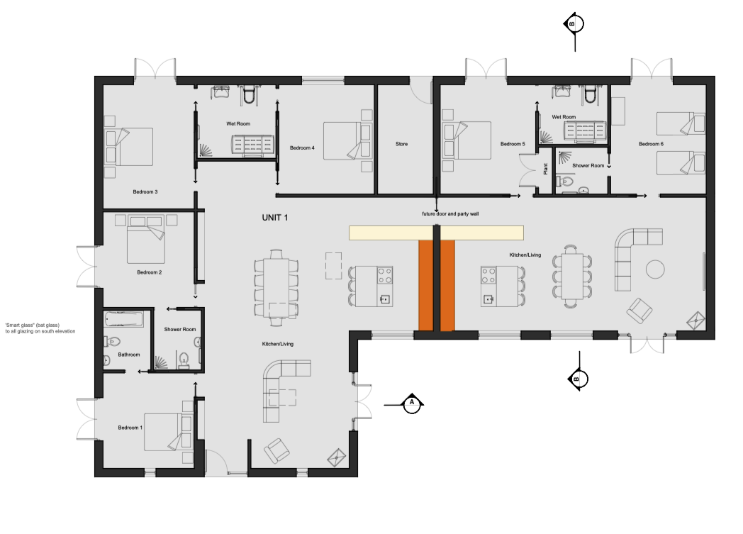 Floor plan of the two Woodland House units under one roof. Each unit contains accessible bedroom/s, bathrooms, wet rooms, kitchens, and living areas. The layout includes shared walls and designated areas for doors and partitions.