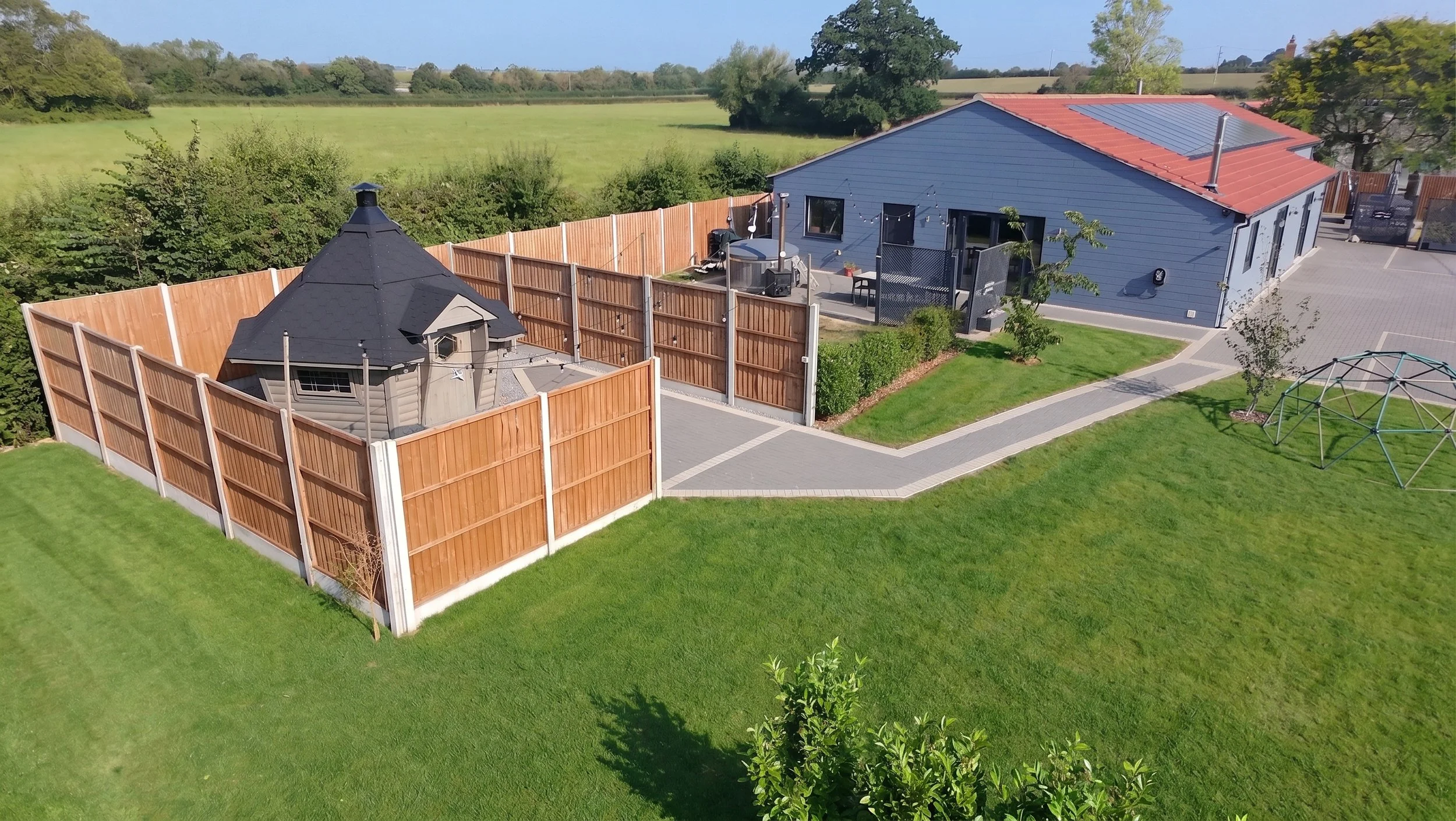 Level access site and secure areas for families and wheelchair users to come together