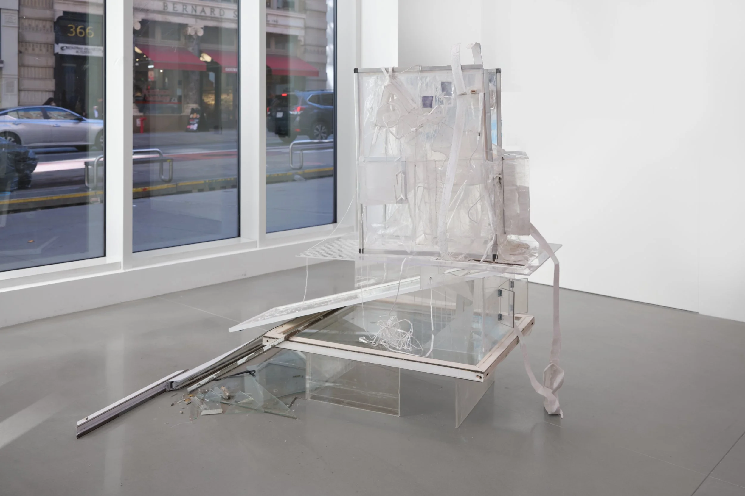 Doubt  
2025, plastic wrap, acrylic sheet, plaster, plaster cloth, steel wire, tape, wood, mirror, window frame, glass, USB cable, inkjet print on paper, wax, sheet metal, water, vodka, needle, dust (Photography: Charlie Rubin)
