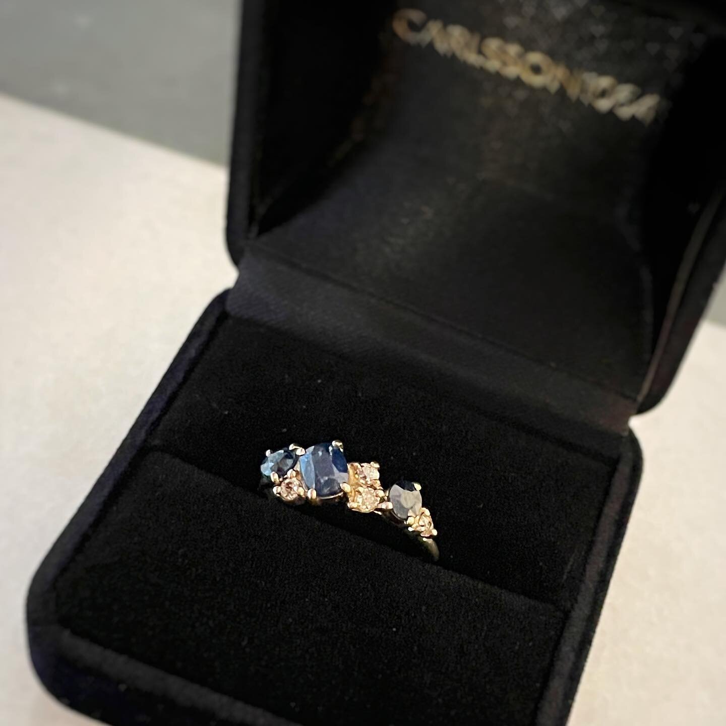 The stones from this ring were repurposed from an heirloom ring from his grandmother. His primary reason for doing this was that he felt his girlfriend would want a recycled stones rather than a new one. He will now use the yellow gold from the origi