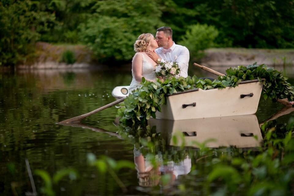 adventurous-bride-and-groom-in-rowboat.jpg