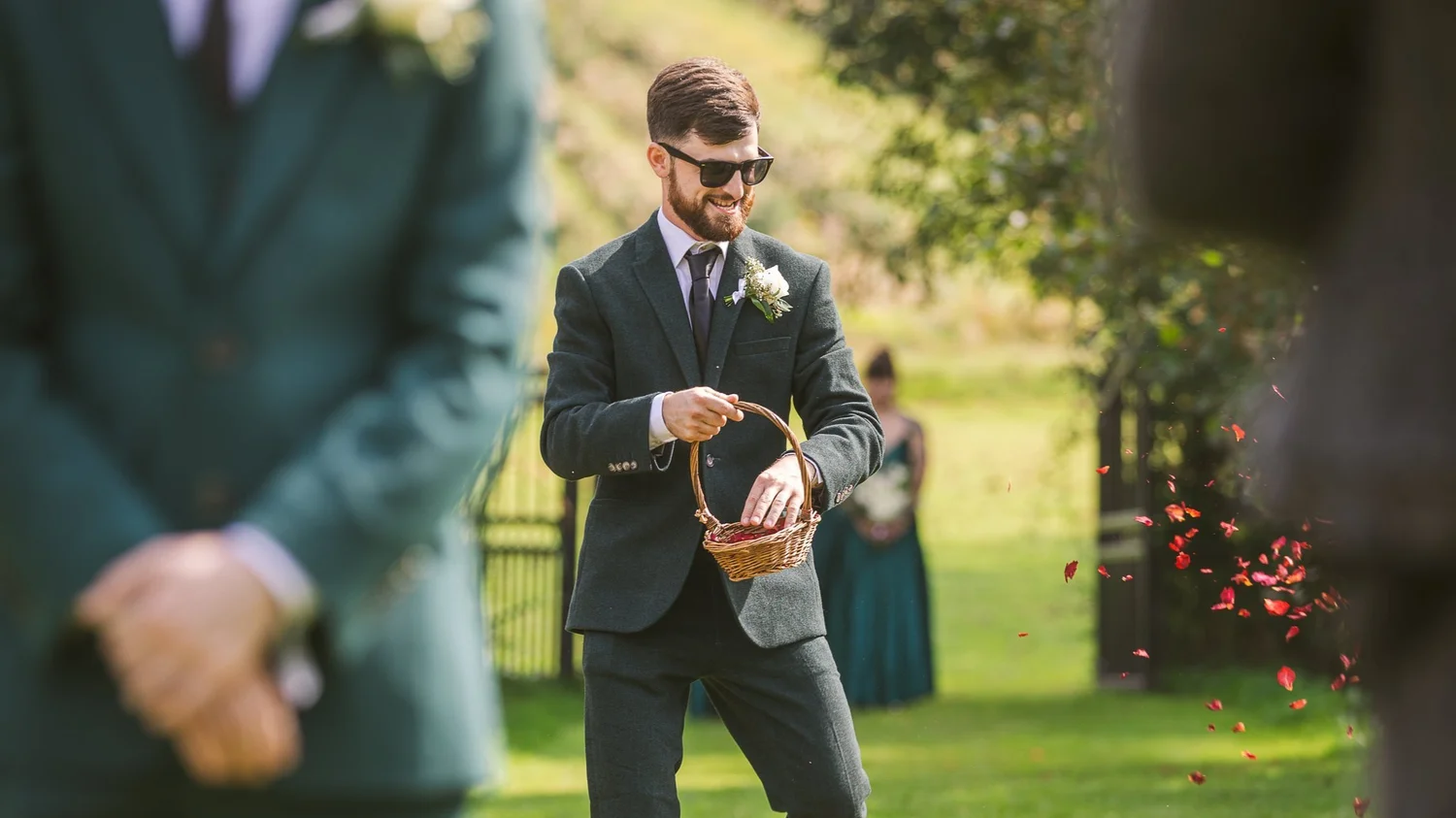 Groom in sunglasses having fun on the day