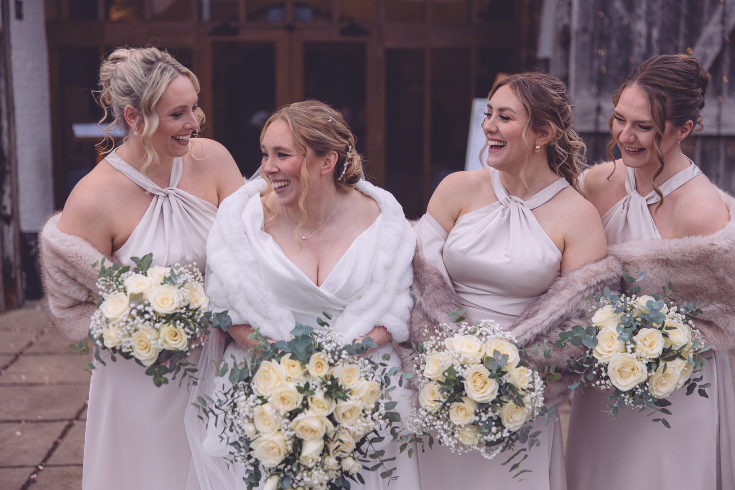 Bridesmaids laughing together