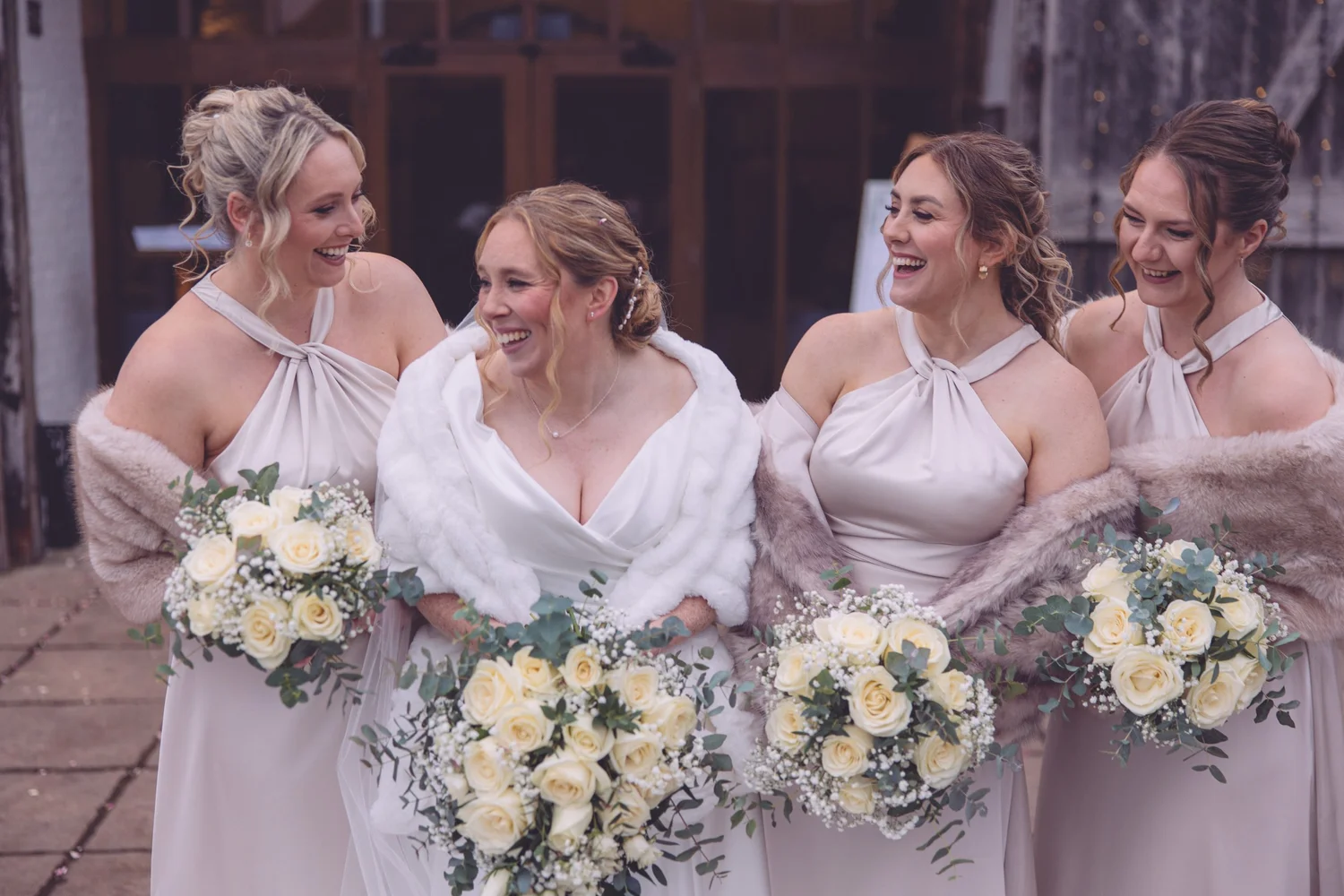 Bridesmaids laughing together