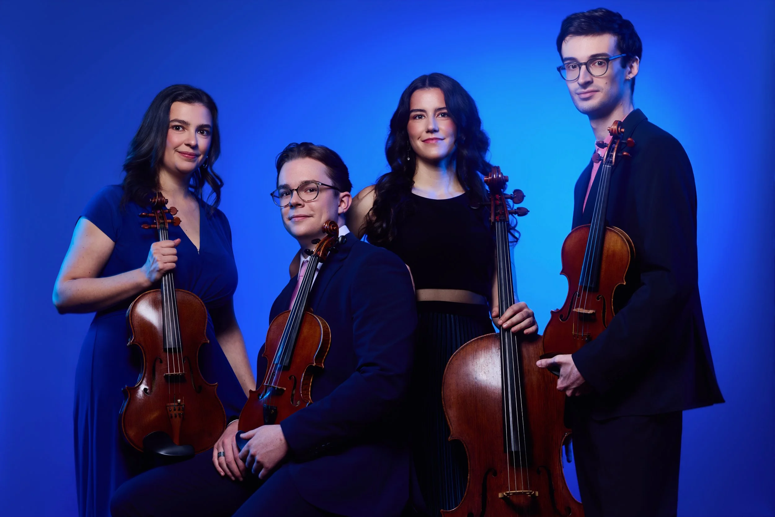 CLICK TO DOWNLOAD left to right: Maren Rothfritz, viola; Sam Parrini, violin; Drake Driscoll, cello; Giancarlo Latta, violin
Photo: Titilayo Ayangade