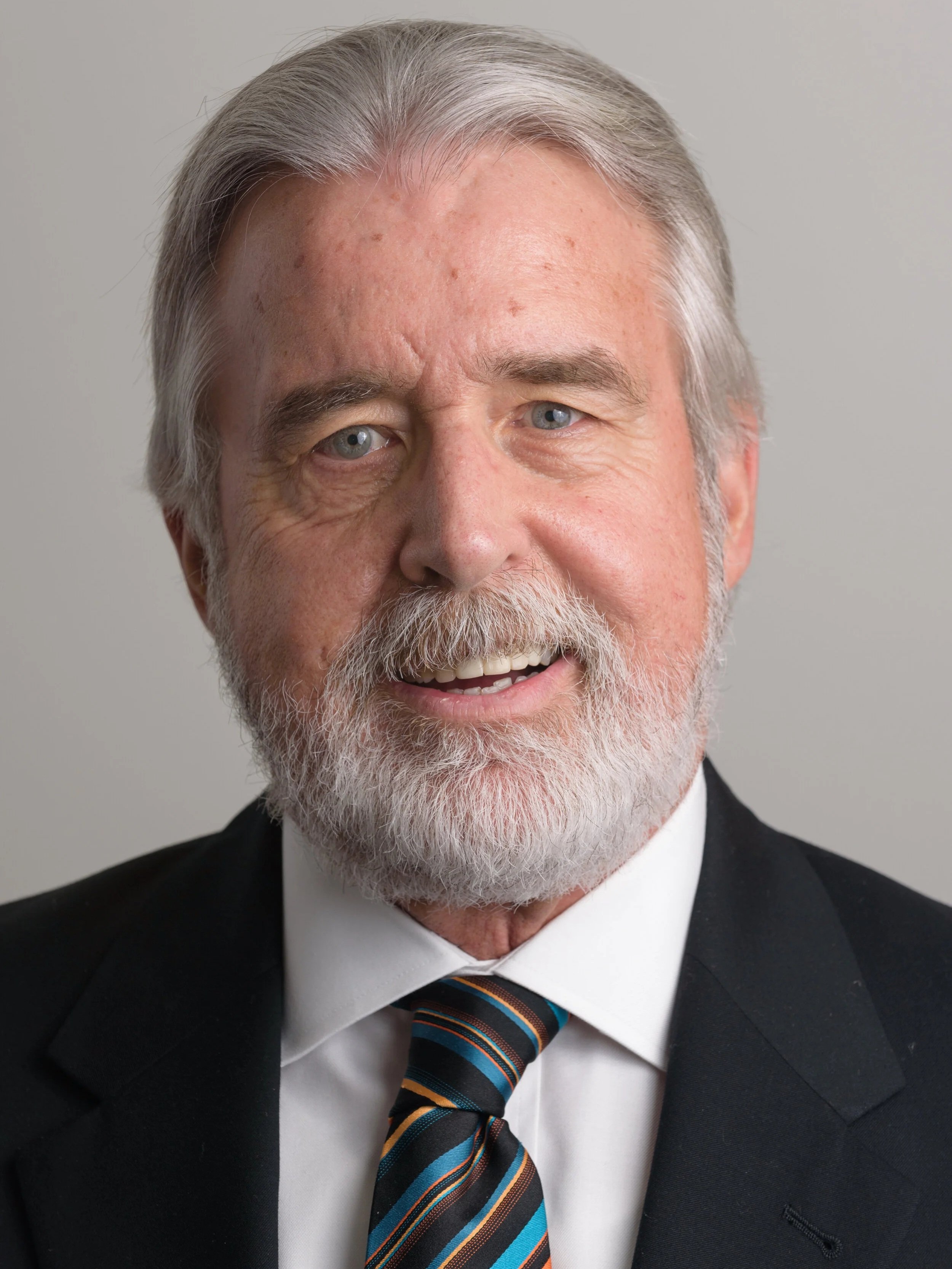 John W. Cairnes, Founder of John W. Cairnes Realty Co. and former Maryland State Realtor of the Year, a pillar of the Harford County community.