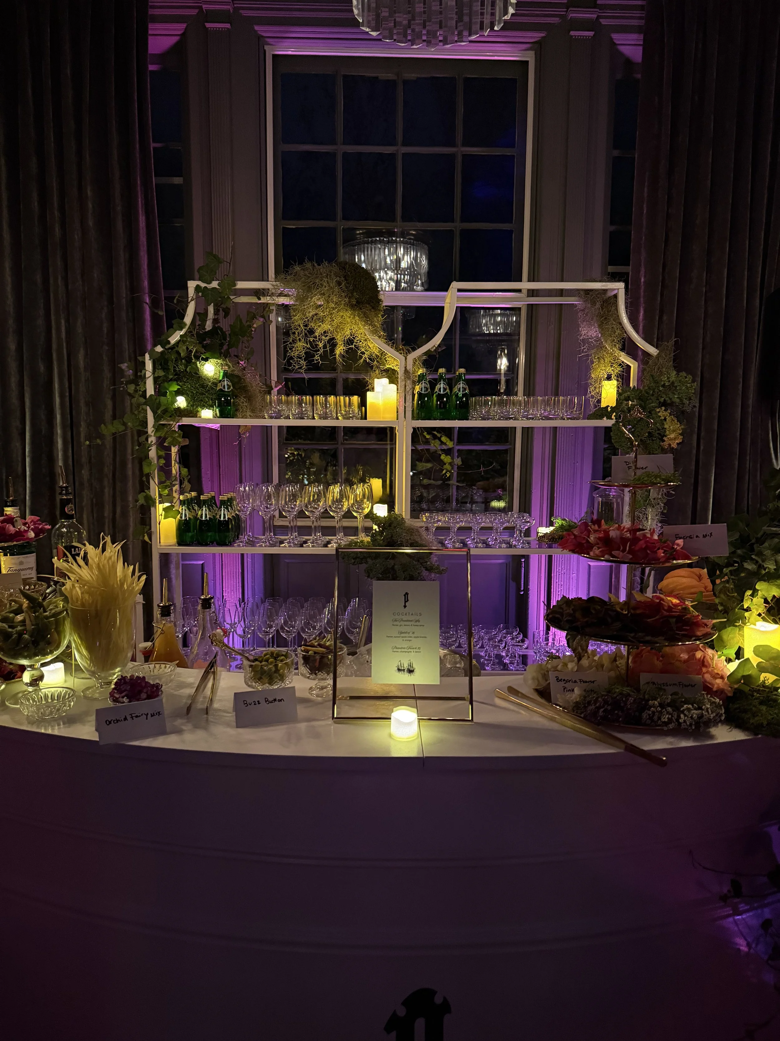 Full Perrier brand activation event setup with styled bar garnish station and ambient lighting Service Matters North East