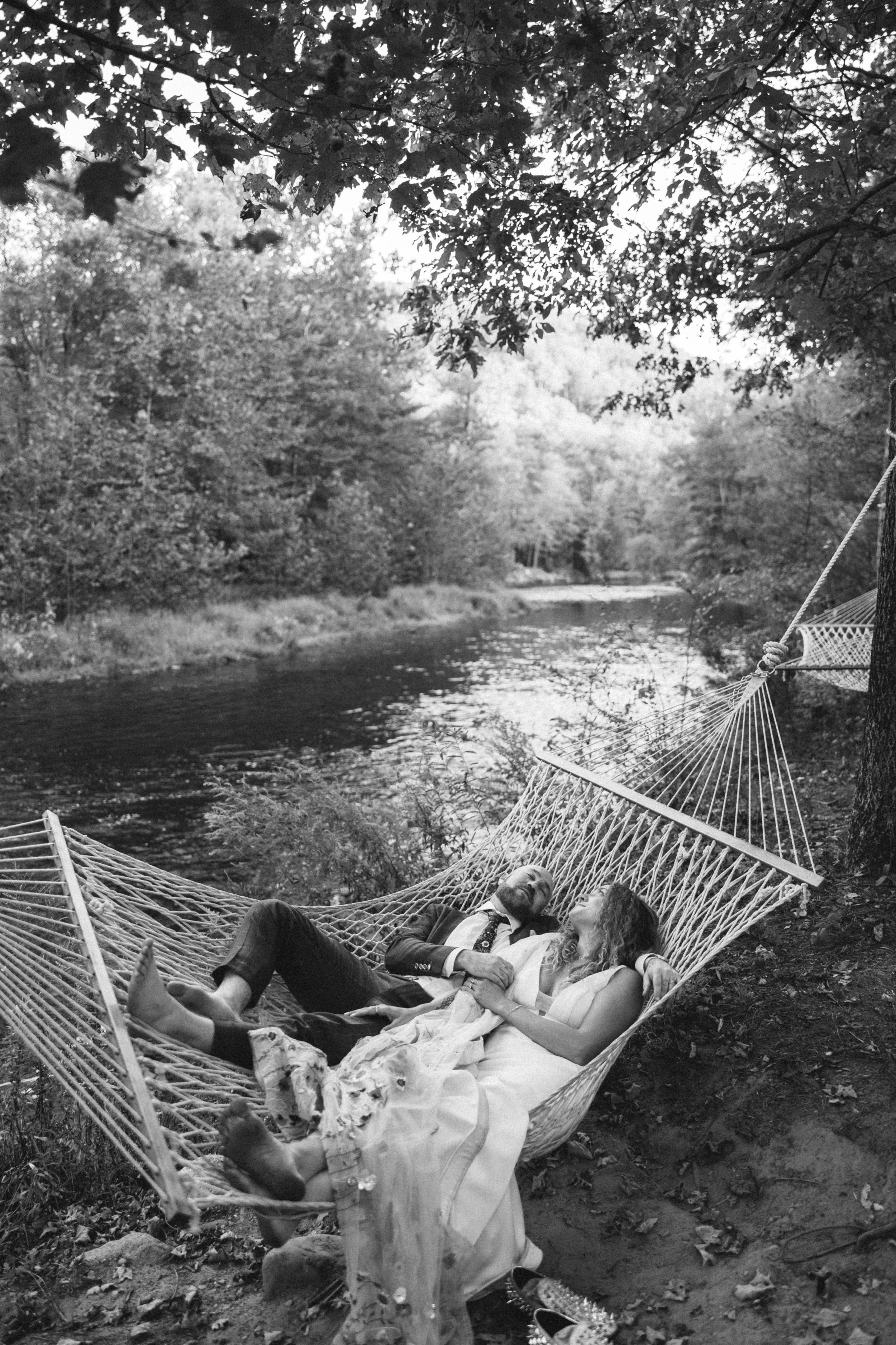 Hudson Valley wedding couple relaxing on hammock Service Matters North East
